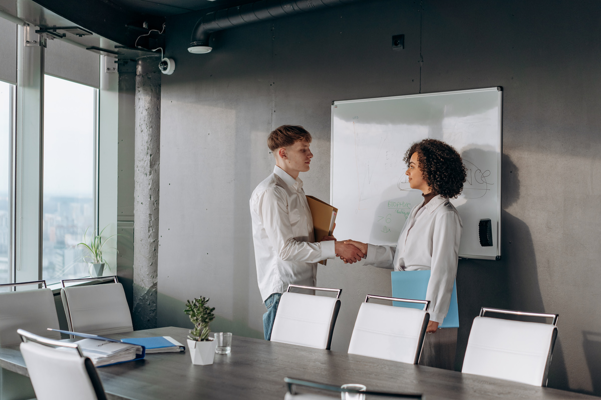 Professionals sealing a partnership with a handshake